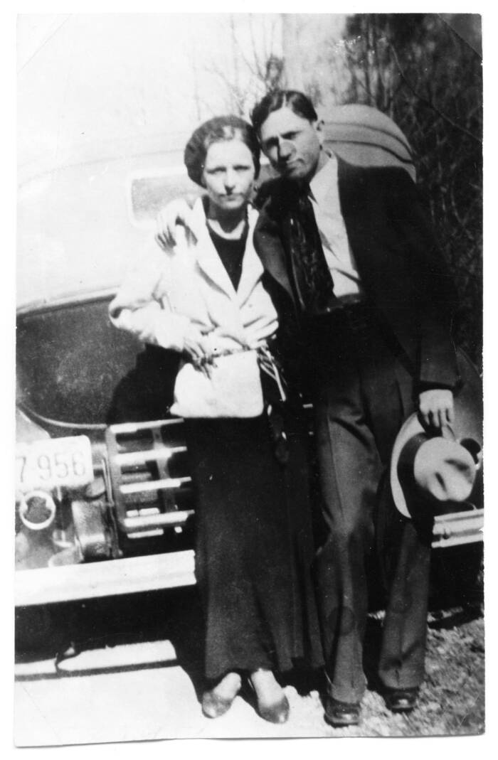 Bonnie And Clyde In Front Of A Car