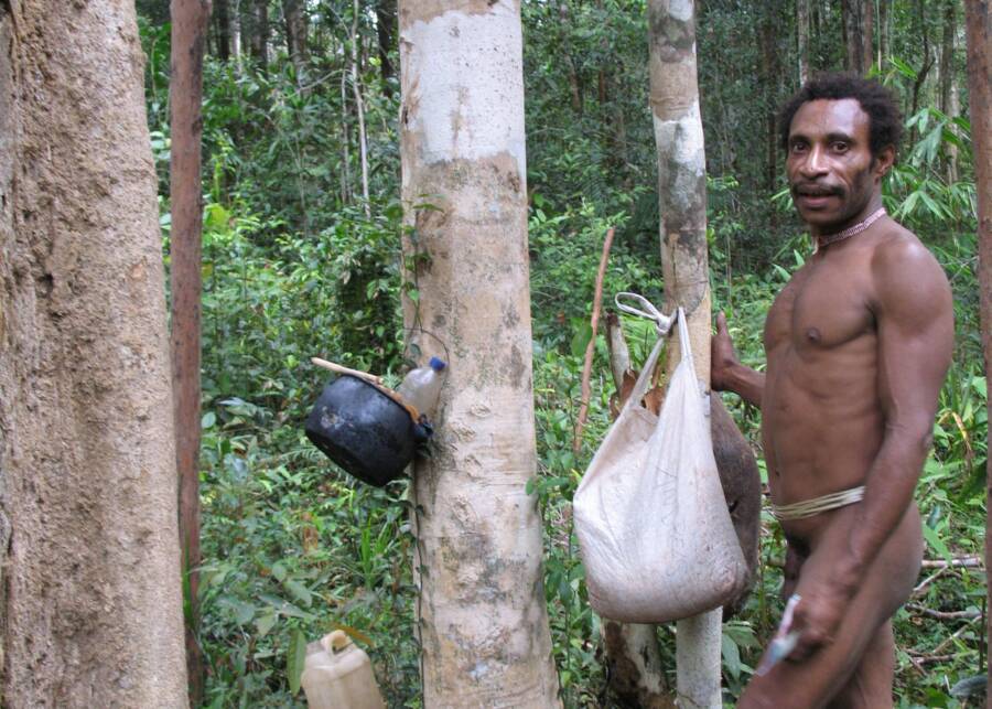 Korowai Man With Shop Goods