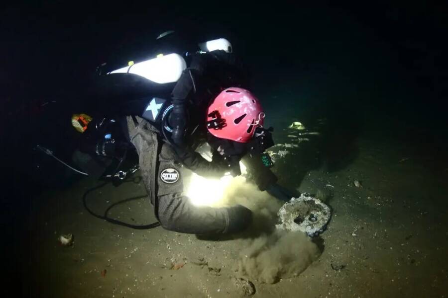 Diver Searching The Shipwreck