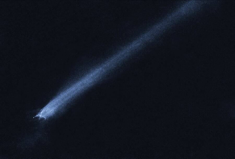 Asteroid And Trailing Debris