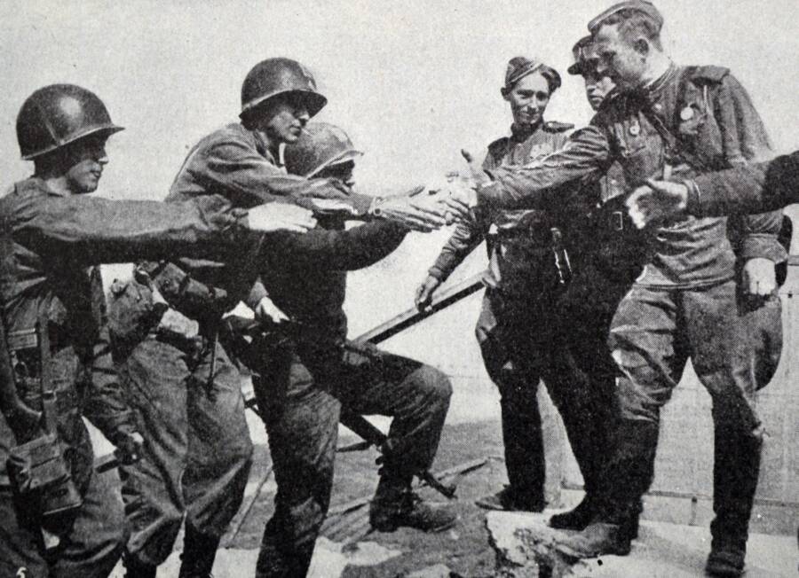 American And Russian Troops Shaking Hands