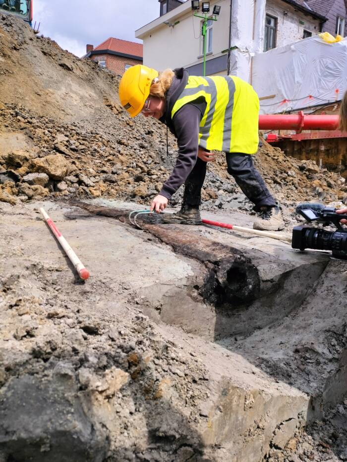 Archaeologist With Wooden Pipe