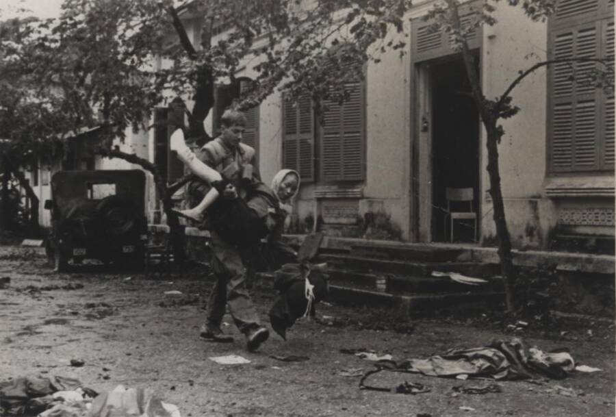 Marine Evacuating A Refugee During The Battle Of Hue