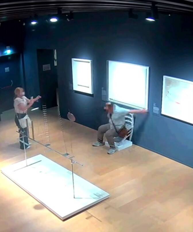 Tourist Crushes Museum Chair