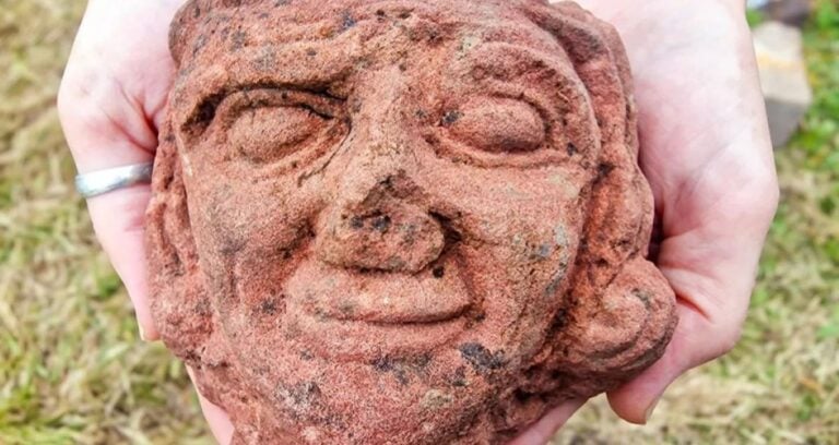 Carved Stone Head Featured