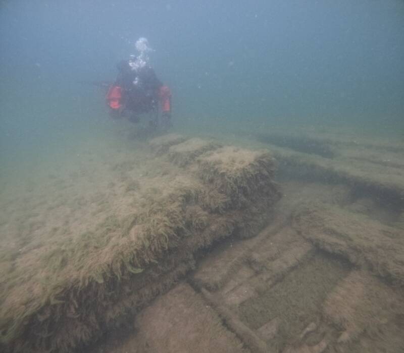 Diver With The Frank D Barker Shipwreck