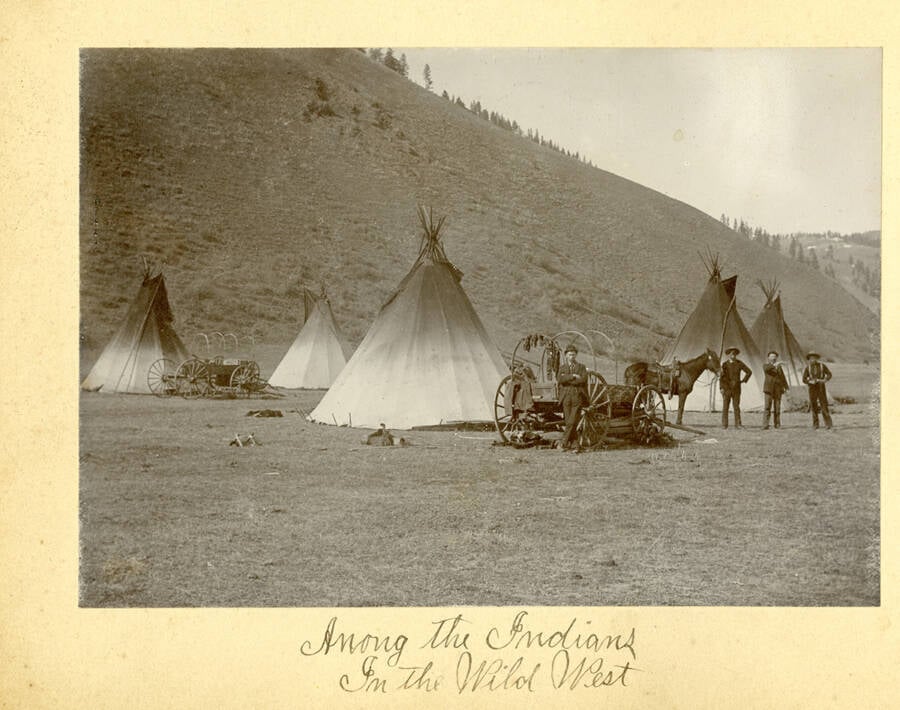 Men In Front Of Teepees