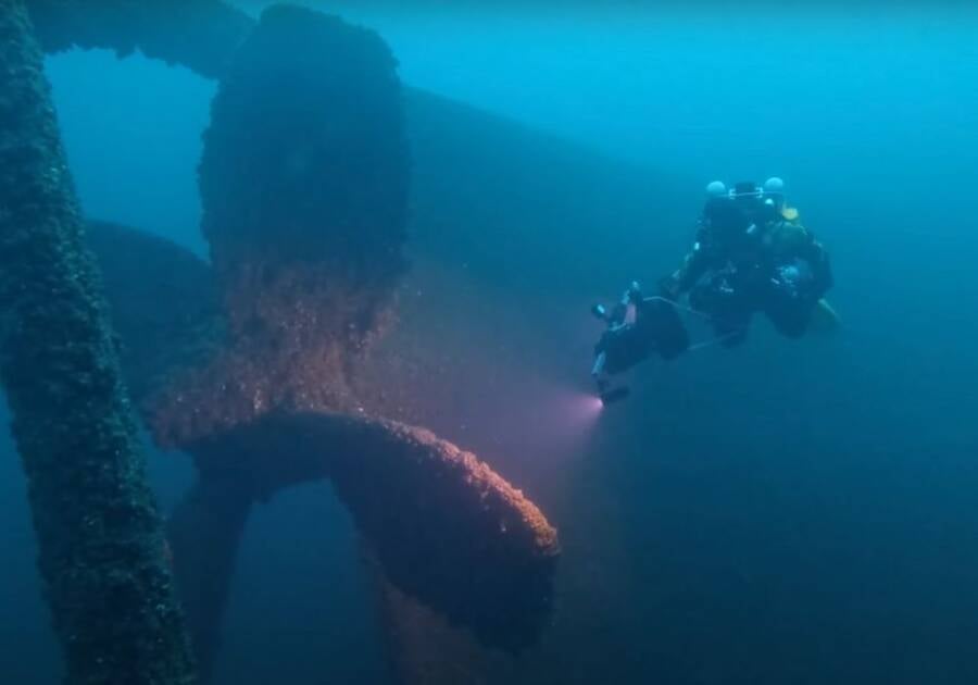 Diver Exploring Shipwreck
