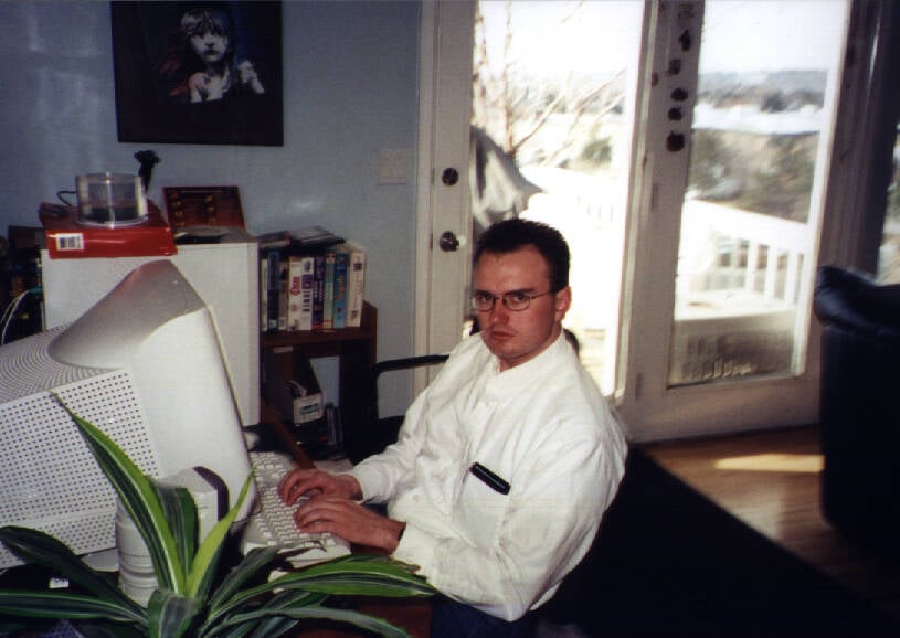 Man At His Home Computer