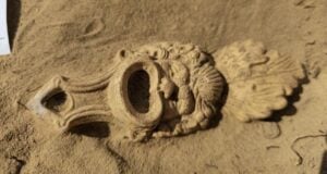 Roman Mask Oil Lamp Closeup Featured