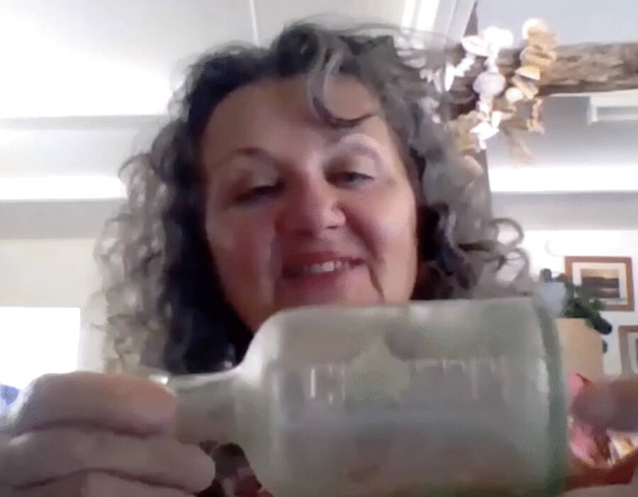 Debra Brown Holding Message In A Bottle