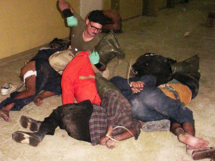 Charles Graner Jr Punching Prisoners