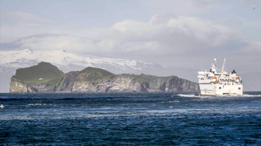 Ship Passing The Loneliest House In The World
