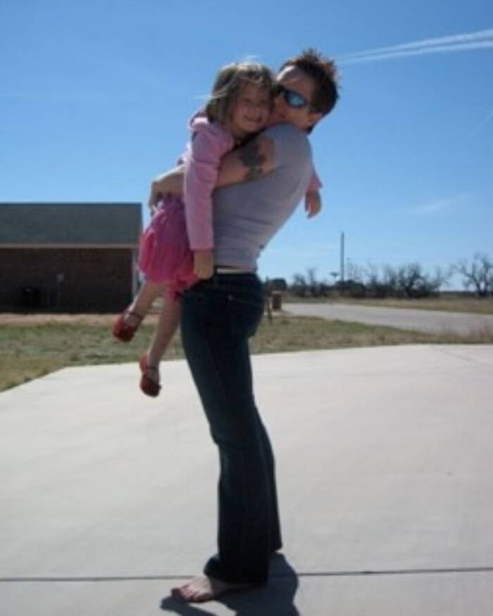 Charity Lee Holding Her Daughter