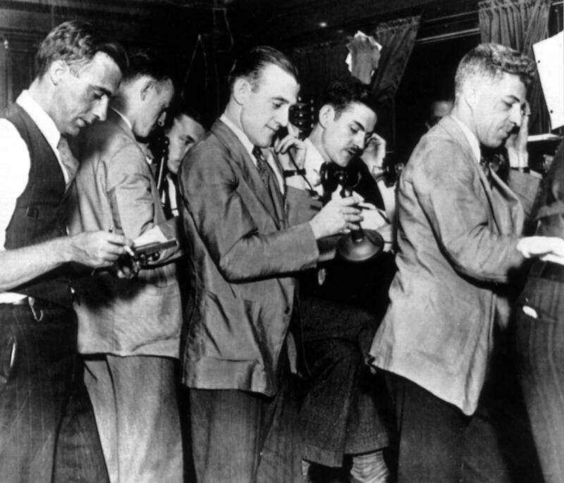 Stockbrokers At The New York Stock Exchange