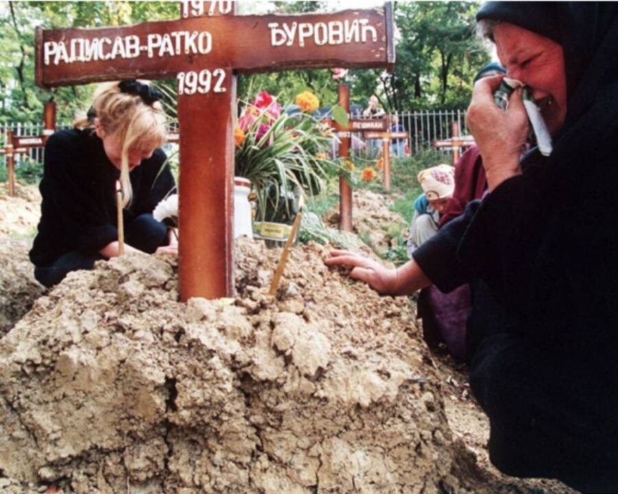 Women Mourning A Grave