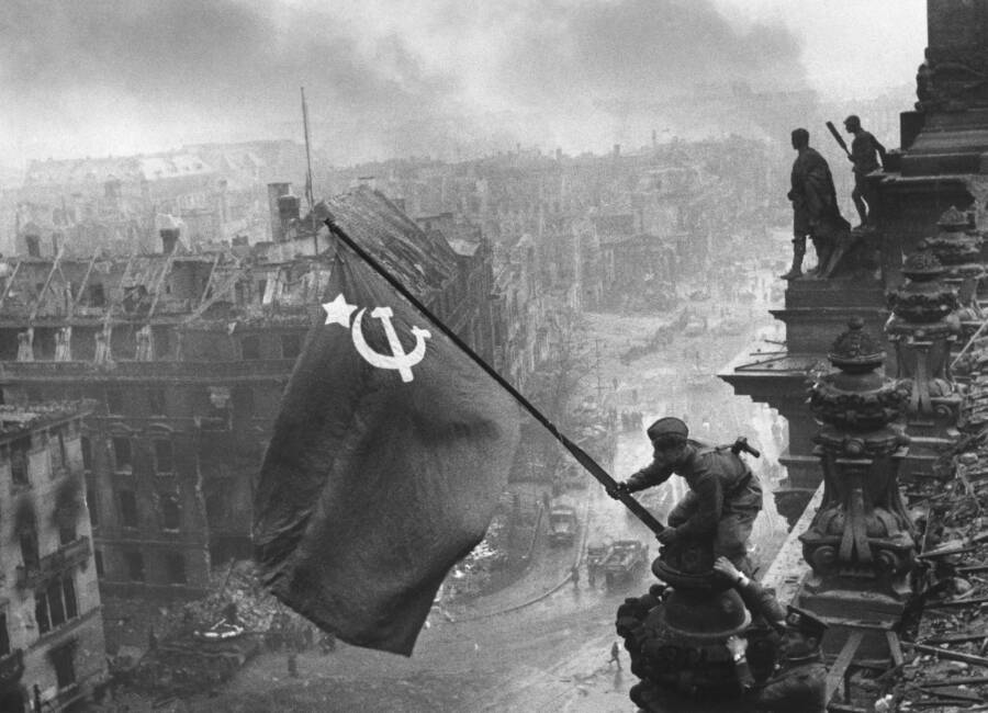 Soviet Troops Raising A Flag After The Battle Of Berlin