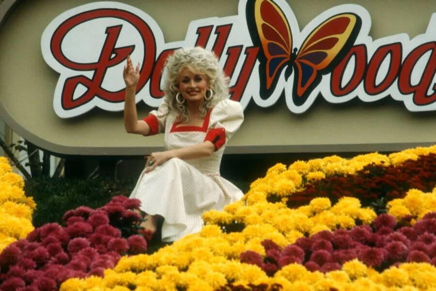 Dolly Parton With Dollywood Sign