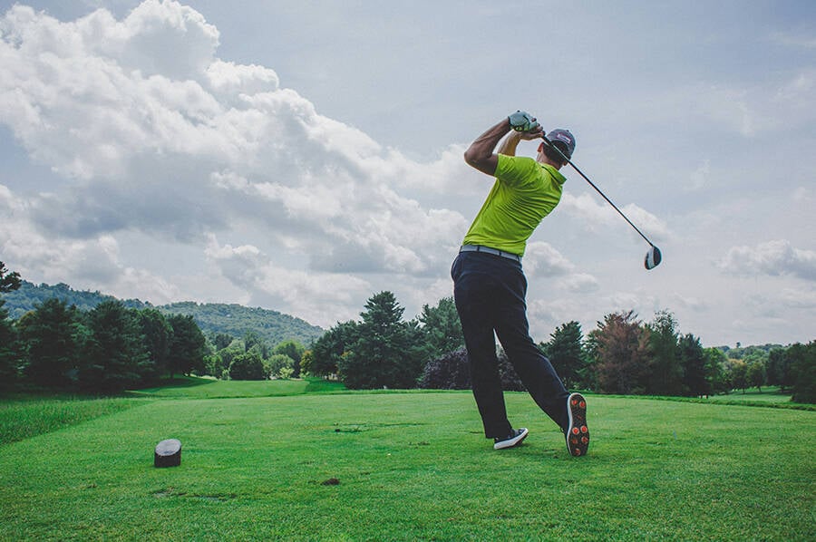 Man Playing Golf